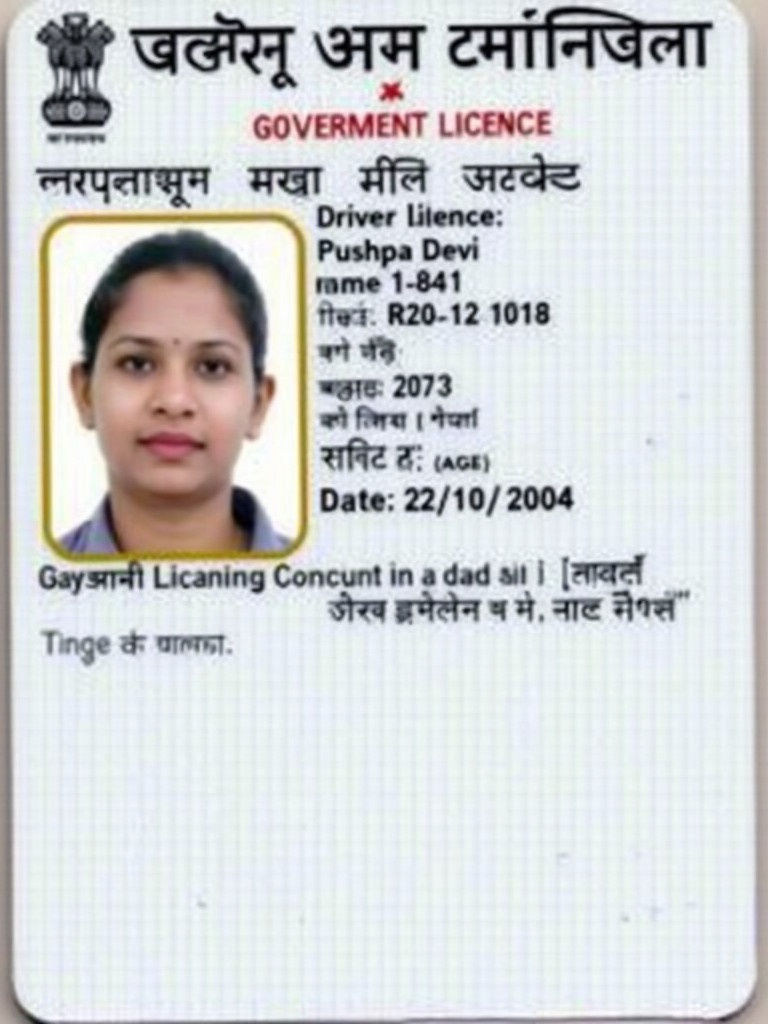 Image displays an Indian driver license card. The card shows the name Pushpa Devi. Age is 20 listed on the ID. Birth date is 22/10/2004. Card follows a government card format. The design of the card is clean and professional. Suitable for identification purposes.