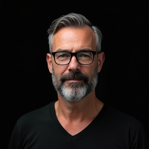 Highly detailed ultra-HD digital portrait of a middle-aged man. Man has a full gray beard and wears black-framed glasses. Hair is combed back. He wears a black V-neck shirt. Background is black gradient. Style is modern and professional with realistic lighting and sharp details.